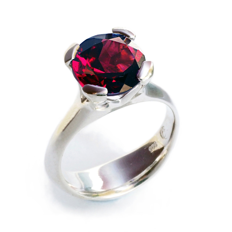 Silver Anemone ring with garnet