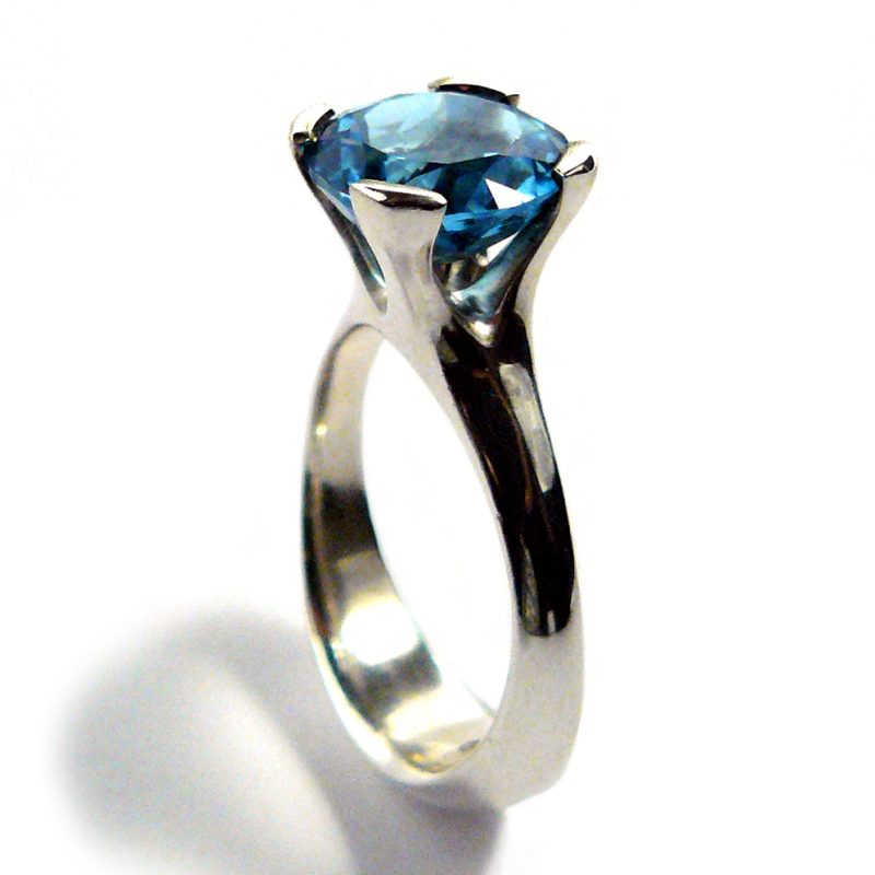 Anemone ring with blue topaz