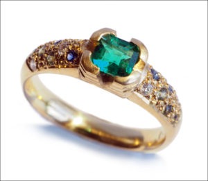 18ct gold, emerald, sapphire and diamond engagement ring