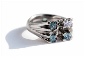 Platinum, diamond and sapphire engagement ring based on constellation Delphinus.