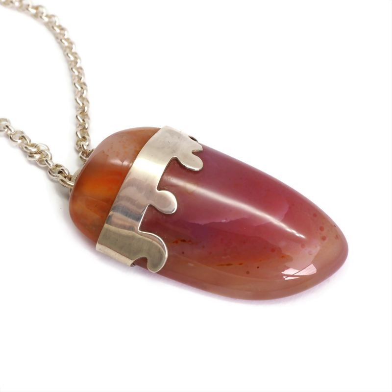 Reddish agate pendant set with sterling silver