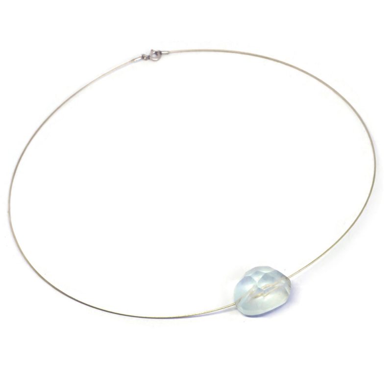 Aquamarine crystal on silver cable.
